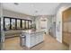 Community kitchen featuring a large island, stainless steel appliances, and ample counter space at 11050 Sandhill Preserve Dr, Sarasota, FL 34238
