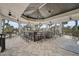 Community pavilion with full bar area, and ample seating all around at 11050 Sandhill Preserve Dr, Sarasota, FL 34238