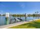 Waterfront property featuring a private boat lift for easy access to boating and water activities at 1137 N Lake Shore Dr, Sarasota, FL 34231