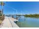 Featuring a private boat lift for easy access to boating and water activities, along with waterfront views at 1137 N Lake Shore Dr, Sarasota, FL 34231