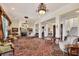 Open-concept living area with fireplace and large windows offering ample natural light at 1137 N Lake Shore Dr, Sarasota, FL 34231