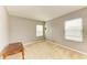 Bedroom with plush carpet and multiple bright windows at 11411 Flora Springs Dr, Riverview, FL 33579