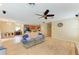 Open floor plan living room flowing into kitchen at 11411 Flora Springs Dr, Riverview, FL 33579