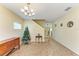 Open living room space with carpet flooring at 11411 Flora Springs Dr, Riverview, FL 33579