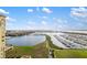 A beautiful scenic view of the marina with blue sky at 130 Riviera Dunes Way # 1201, Palmetto, FL 34221