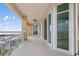 Wide balcony with tile floors, ceiling fan, and amazing water views at 130 Riviera Dunes Way # 1201, Palmetto, FL 34221