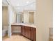 Bathroom featuring tile flooring, vanity with granite countertop and toilet at 130 Riviera Dunes Way # 1201, Palmetto, FL 34221