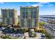 Exterior of high-rise buildings with meticulously landscaped lawns and convenient parking at 130 Riviera Dunes Way # 1201, Palmetto, FL 34221