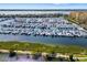 Aerial view of a marina full of boats docked on the water at 130 Riviera Dunes Way # 1201, Palmetto, FL 34221