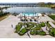Aerial view of the community miniature golf course next to the resort-style pool at 130 Riviera Dunes Way # 1201, Palmetto, FL 34221