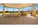 Outdoor dining and kitchen area with plenty of seating at 130 Riviera Dunes Way # 1201, Palmetto, FL 34221