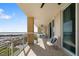 Beautiful balcony with seating and marina views offers a relaxing outdoor experience at 130 Riviera Dunes Way # 902, Palmetto, FL 34221