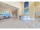 Spacious lobby featuring a reception desk, comfortable seating, and elegant decor at 130 Riviera Dunes Way # 902, Palmetto, FL 34221