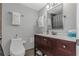 Well-lit bathroom with a modern vanity, white countertops, and ample storage space at 1300 Gulf Blvd # 202, Indian Rocks Beach, FL 33785