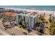 Beachfront condo building featuring a coastal design and beautiful ocean views at 1300 Gulf Blvd # 202, Indian Rocks Beach, FL 33785
