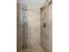Stylish shower with decorative tile and modern fixtures at 1300 Gulf Blvd # 202, Indian Rocks Beach, FL 33785