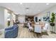 Spacious community clubhouse featuring comfortable seating, dining tables, and a kitchenette at 14021 Bellagio Way # 309, Osprey, FL 34229