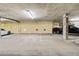 A well lit underground parking garage with marked parking spots ready for vehicle storage at 14021 Bellagio Way # 309, Osprey, FL 34229