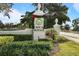Boca Royale community entrance signage featuring holiday decor and lush landscaping at 2 Antigua Cir # 4, Englewood, FL 34223