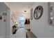 Well-decorated hallway leading to the laundry room, featuring modern lighting and decorative accents at 209 Okeeffe Cir, Bradenton, FL 34212