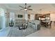 Inviting living room open to the kitchen and dining area, perfect for entertaining and Gathering gatherings at 209 Okeeffe Cir, Bradenton, FL 34212