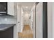 Hallway with white doors and modern trim detail, connecting different areas of the home with style at 2118 7Th W St, Palmetto, FL 34221