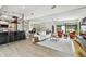 Inviting living space with an open kitchen, dining area, and comfortable seating arrangement at 2118 7Th W St, Palmetto, FL 34221