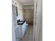 Clean bathroom featuring a tiled shower, modern vanity, and essential fixtures at 216 Amherst Ave # 97, Sarasota, FL 34232