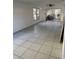 Spacious living room with neutral walls, tile flooring and access to the outside at 216 Amherst Ave # 97, Sarasota, FL 34232