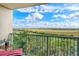Enjoy the expansive view from the balcony overlooking lush landscapes and a stunning sky at 2320 Terra Ceia Bay Blvd # 808, Palmetto, FL 34221