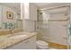 Bathroom featuring granite countertops, glass shower and white ceramic tile in shower at 2320 Terra Ceia Bay Blvd # 808, Palmetto, FL 34221