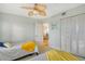 Bedroom featuring twin beds, ceiling fan, and a closet, providing a comfortable and functional space at 2320 Terra Ceia Bay Blvd # 808, Palmetto, FL 34221