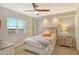Cozy bedroom with a ceiling fan and a large window with nice view at 2320 Terra Ceia Bay Blvd # 808, Palmetto, FL 34221
