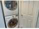 Efficient laundry space featuring stacked, front-load washer and dryer, maximizing space and convenience at 2320 Terra Ceia Bay Blvd # 808, Palmetto, FL 34221