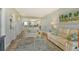 Cozy living room featuring comfortable seating, stylish decor, and an open layout into the kitchen and dining areas at 2320 Terra Ceia Bay Blvd # 808, Palmetto, FL 34221
