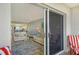 Living room with an outside view, a white sofa, and large sliding glass doors at 2320 Terra Ceia Bay Blvd # 808, Palmetto, FL 34221