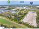 Expansive land parcel highlighted with nearby amenities including Publix and Sarasota Memorial Health Care at 2900 Curry Ln, Nokomis, FL 34275