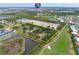 Expansive land parcel surrounded by community homes, a golf course, and easy highway access at 2900 Curry Ln, Nokomis, FL 34275