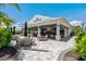 Bahama Bar exterior with outdoor seating and lush tropical landscaping at 3008 Tolmino Ct, Lakewood Ranch, FL 34211