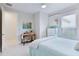 Stylish bedroom boasting a comfy bed, a dresser, and colorful decor at 3008 Tolmino Ct, Lakewood Ranch, FL 34211