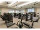 Spacious gym with modern weight machines, fans, and plenty of natural light at 3008 Tolmino Ct, Lakewood Ranch, FL 34211