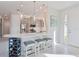 Contemporary kitchen with stainless steel appliances, a breakfast bar and ample countertop space at 3008 Tolmino Ct, Lakewood Ranch, FL 34211