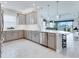 Open concept kitchen with stainless steel appliances and a view of the living room at 3008 Tolmino Ct, Lakewood Ranch, FL 34211