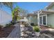 Outdoor dining area and grill in a well-maintained backyard, perfect for entertaining at 3521 Almeria Ave, Sarasota, FL 34239