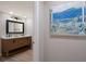 Bathroom with double sinks, modern lighting, and stylish decor at 3521 Almeria Ave, Sarasota, FL 34239