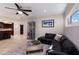 Open-concept living and dining area with tile floors and modern decor at 3521 Almeria Ave, Sarasota, FL 34239