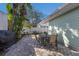 Outdoor patio features string lights and a table for outdoor dining at 3521 Almeria Ave, Sarasota, FL 34239