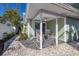 Inviting patio with rocking chairs, perfect for enjoying the outdoors at 3521 Almeria Ave, Sarasota, FL 34239