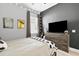 Modern bedroom featuring a bed with soccer ball accents and a large television at 3711 Manorwood Loop, Parrish, FL 34219