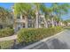 Attractive townhome with verdant landscaping and charming architectural details at 3760 82Nd Avenue E Cir # 101, Sarasota, FL 34243